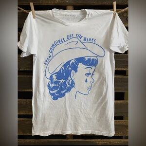 “Even Cowgirls Get the Blues” White T-Shirt